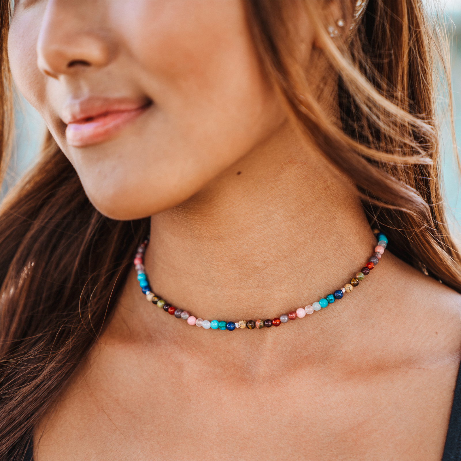 Model wearing 4mm multicolor stone necklace