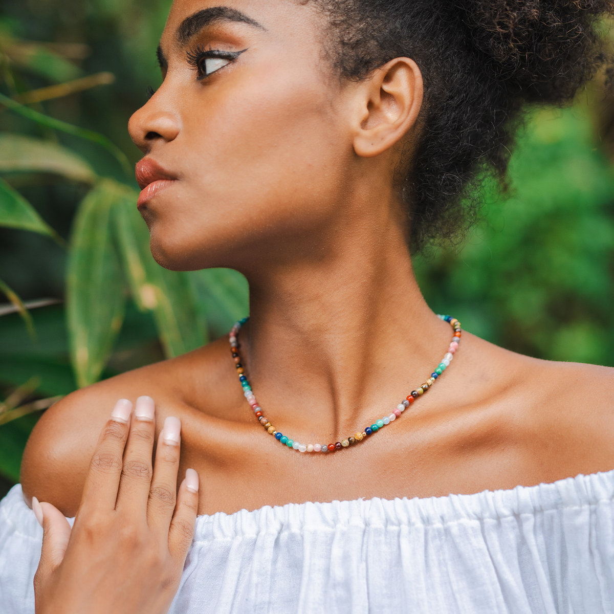 Model wearing 4mm multicolor stone necklace