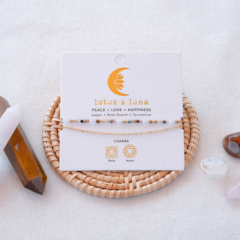 Peace + Love + Happiness 2mm Layered Healing Bracelet, on brand card with crystals