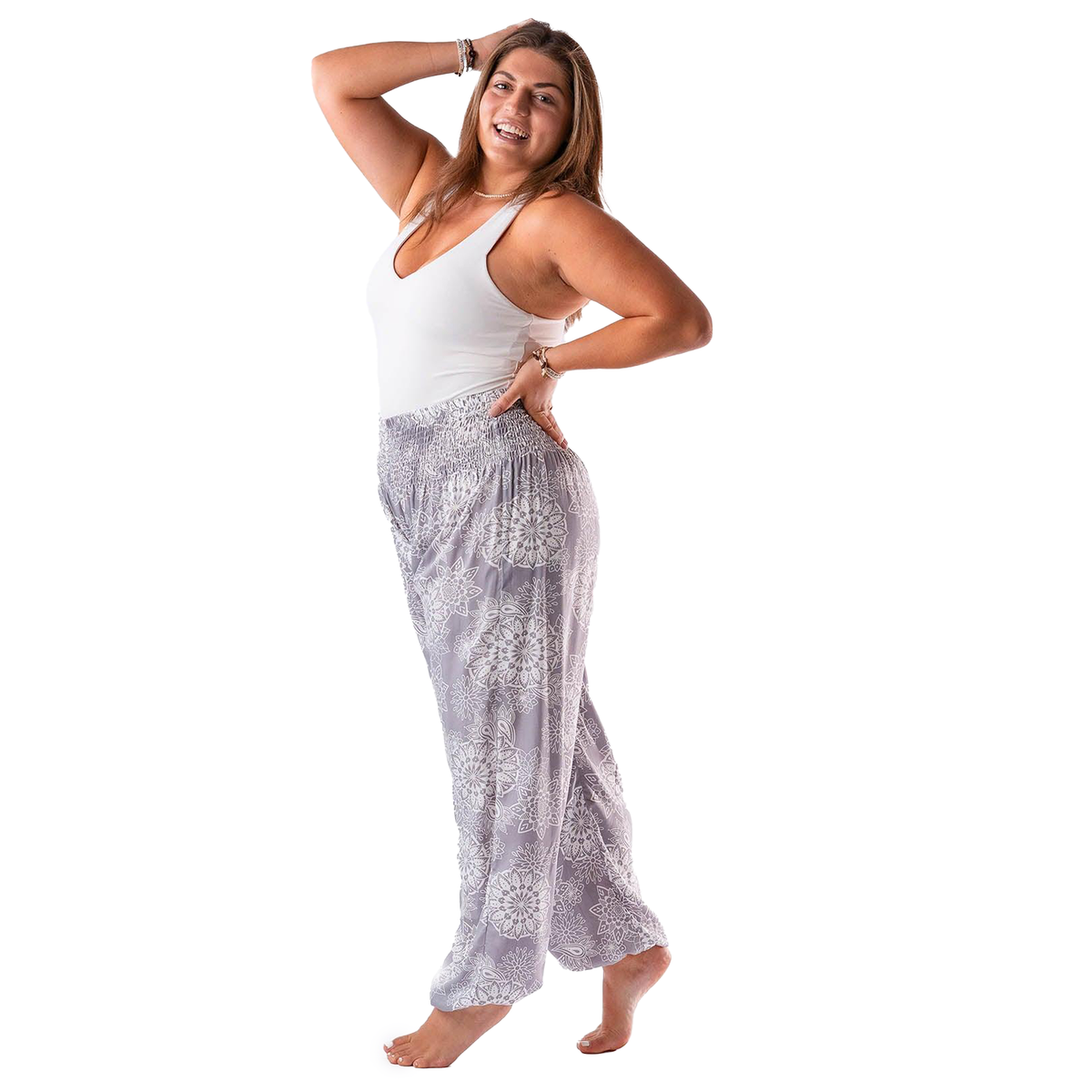 Model wearing lavender harem pants with white mandala paisley print