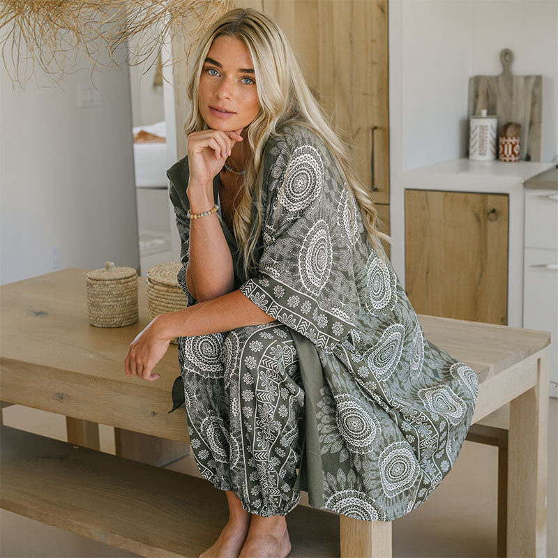 Tuscany Kimono and Harem Pants, worn seated on a table
