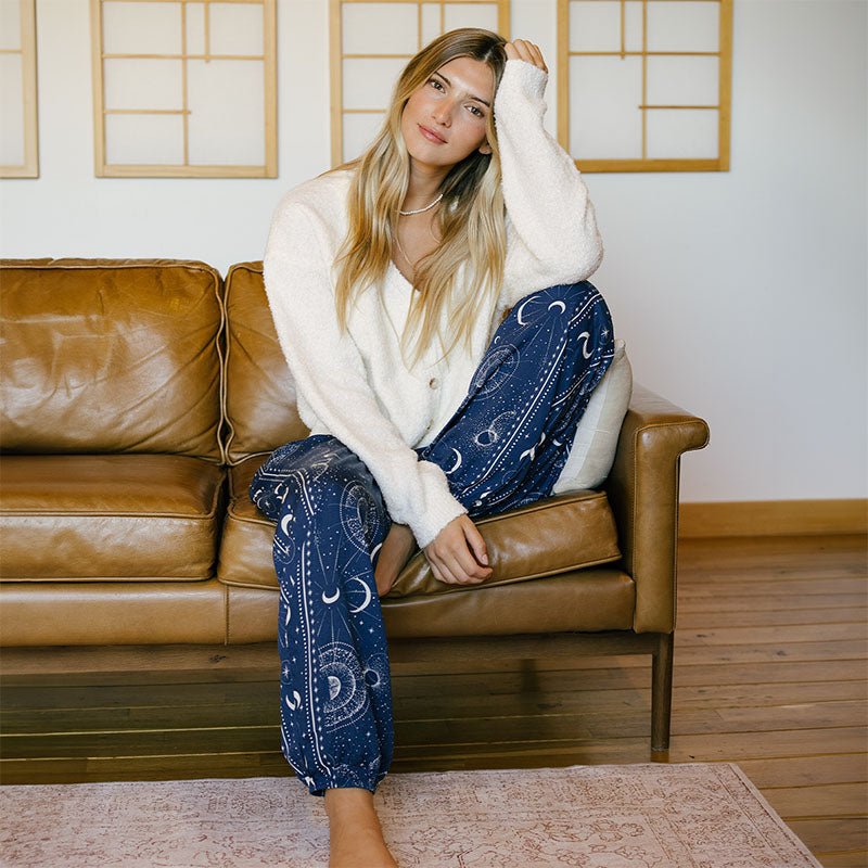 Sapphire Moonlight Harem Pants, seated on sofa with cardigan