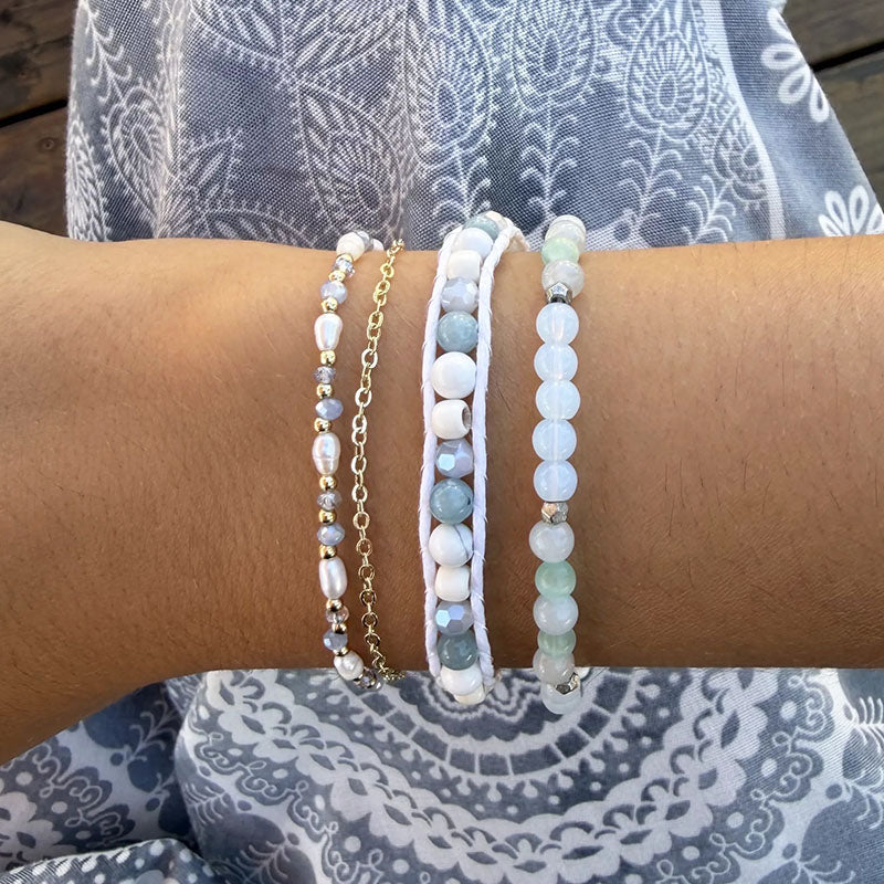 Celeste Everglow Bracelet, stacked with beaded bracelets