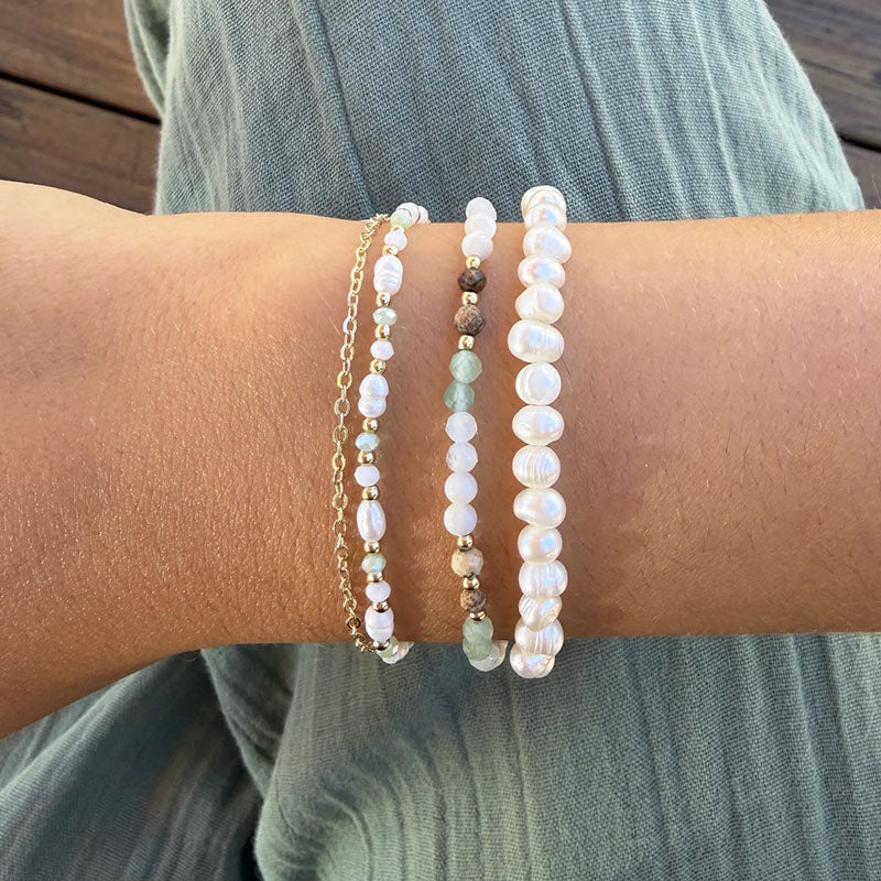 Eden Everglow Bracelet, stacked with pearl bracelets