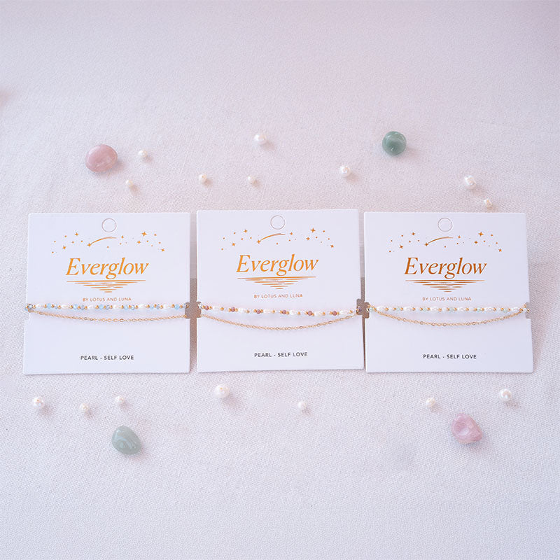 Everglow Pearl Bracelets collection, flat lay on cards