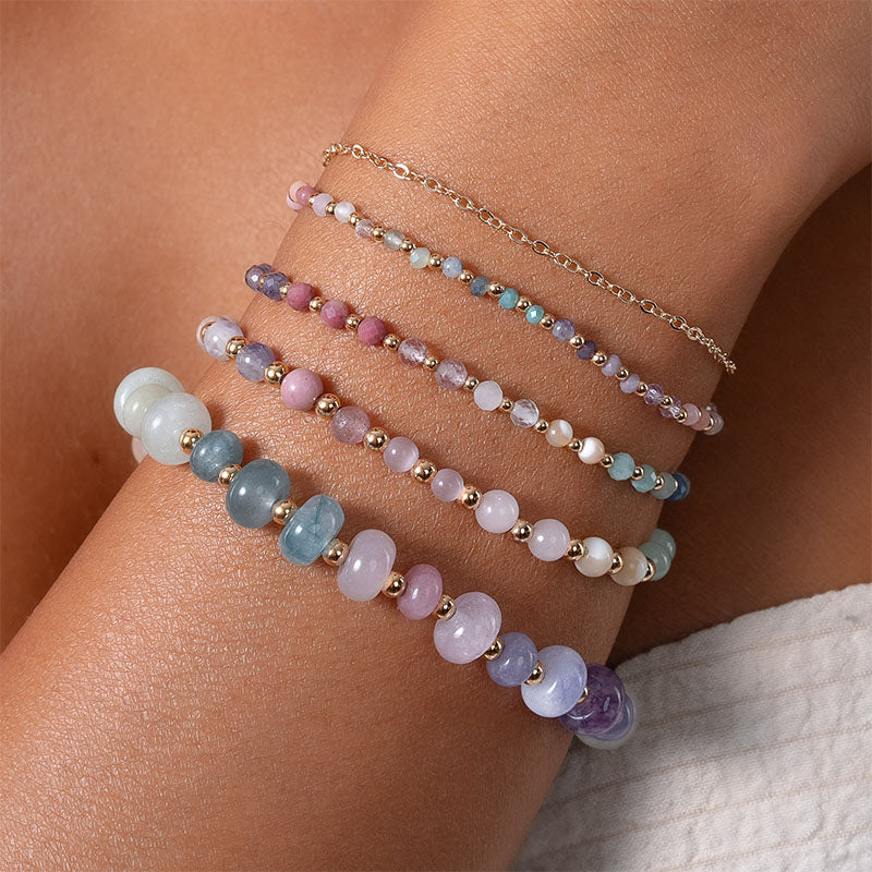 Free Spirit 4mm Healing Bracelet, layered on wrist