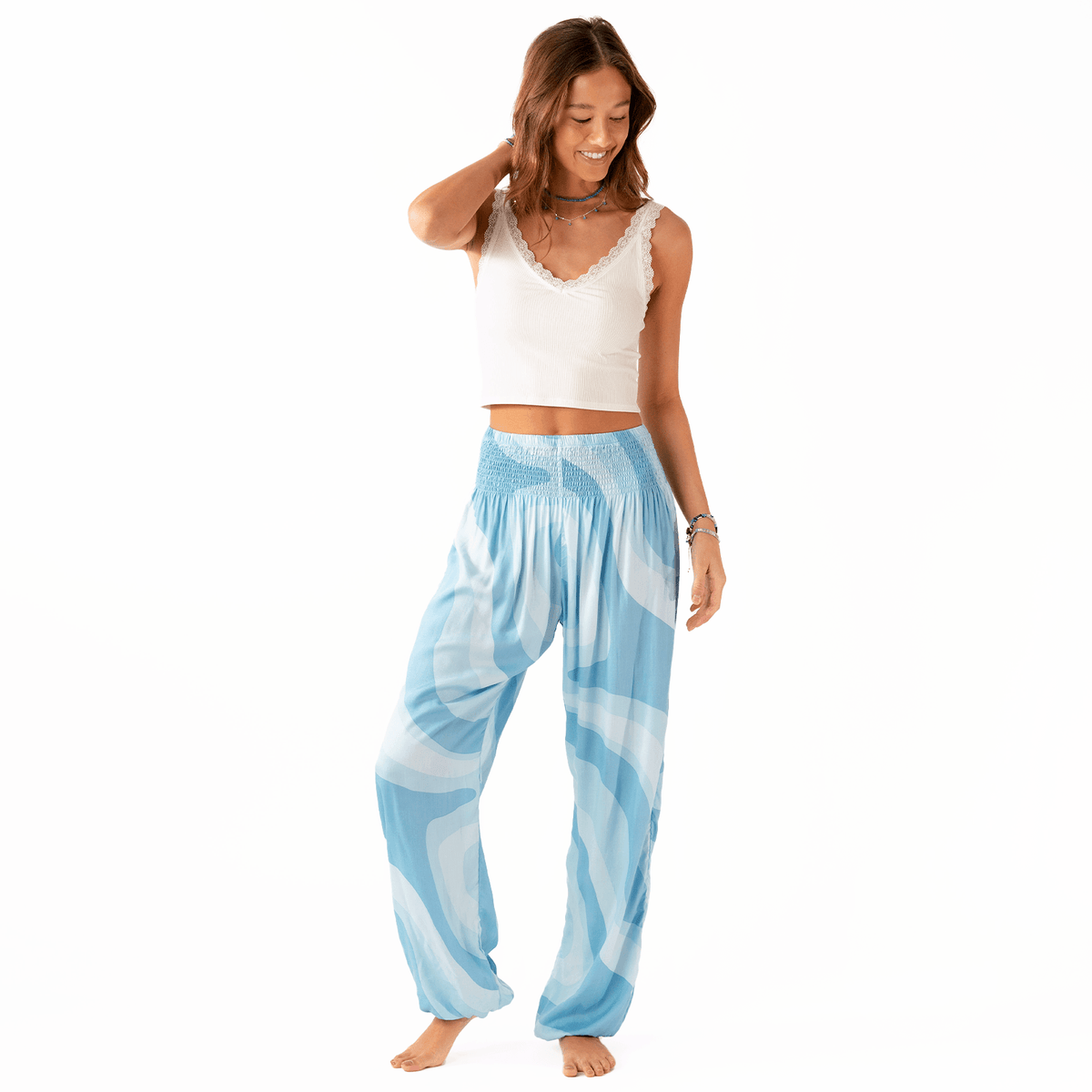 Model wearing blue swirl harem pants