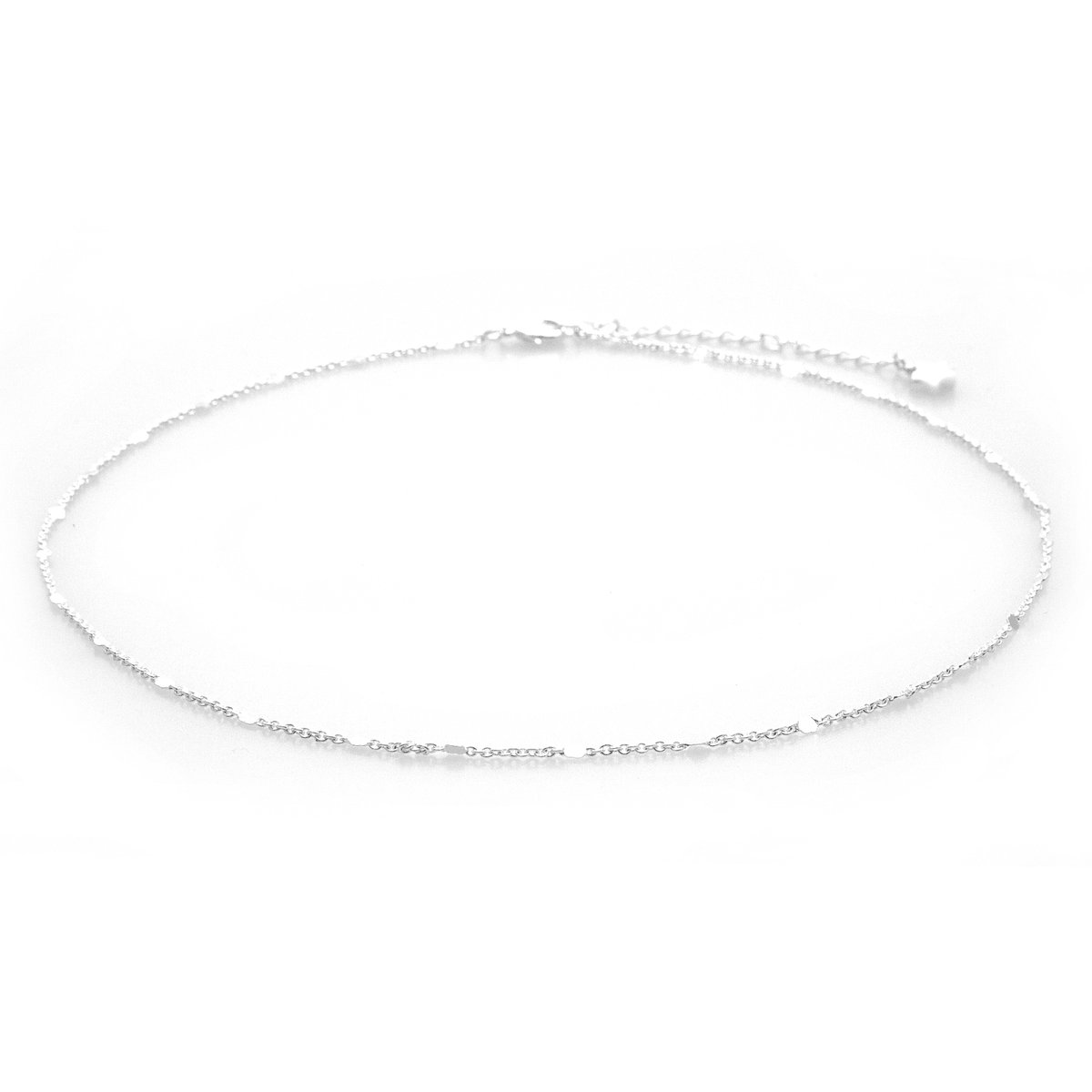 A dainty silver chain necklace