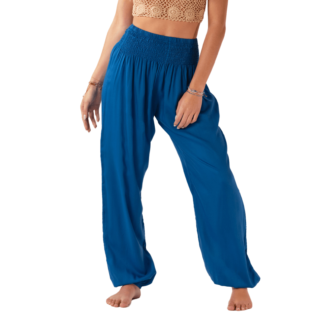 Model wearing cobalt harem pants
