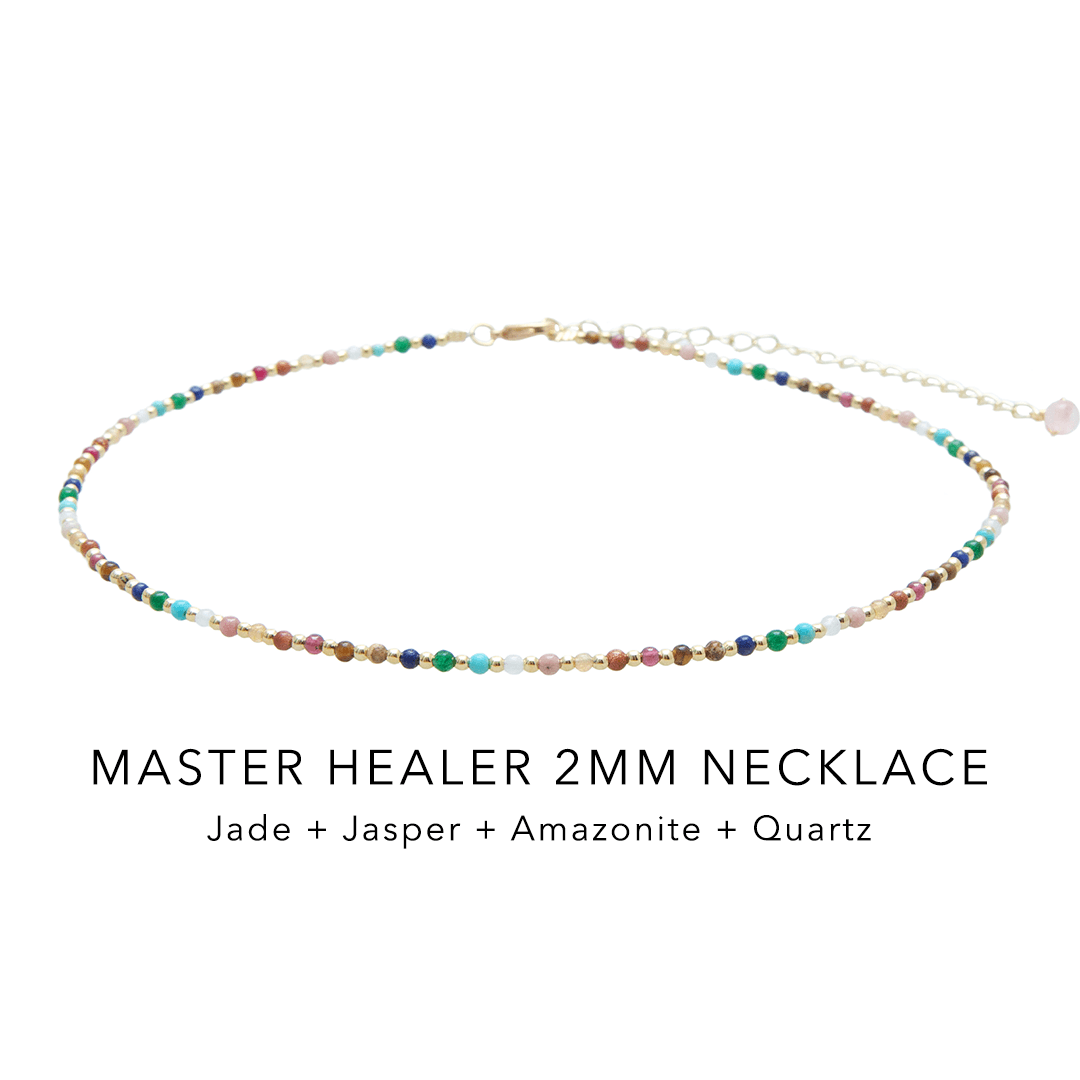 Rainbow stone and gold bead necklace on gold chain