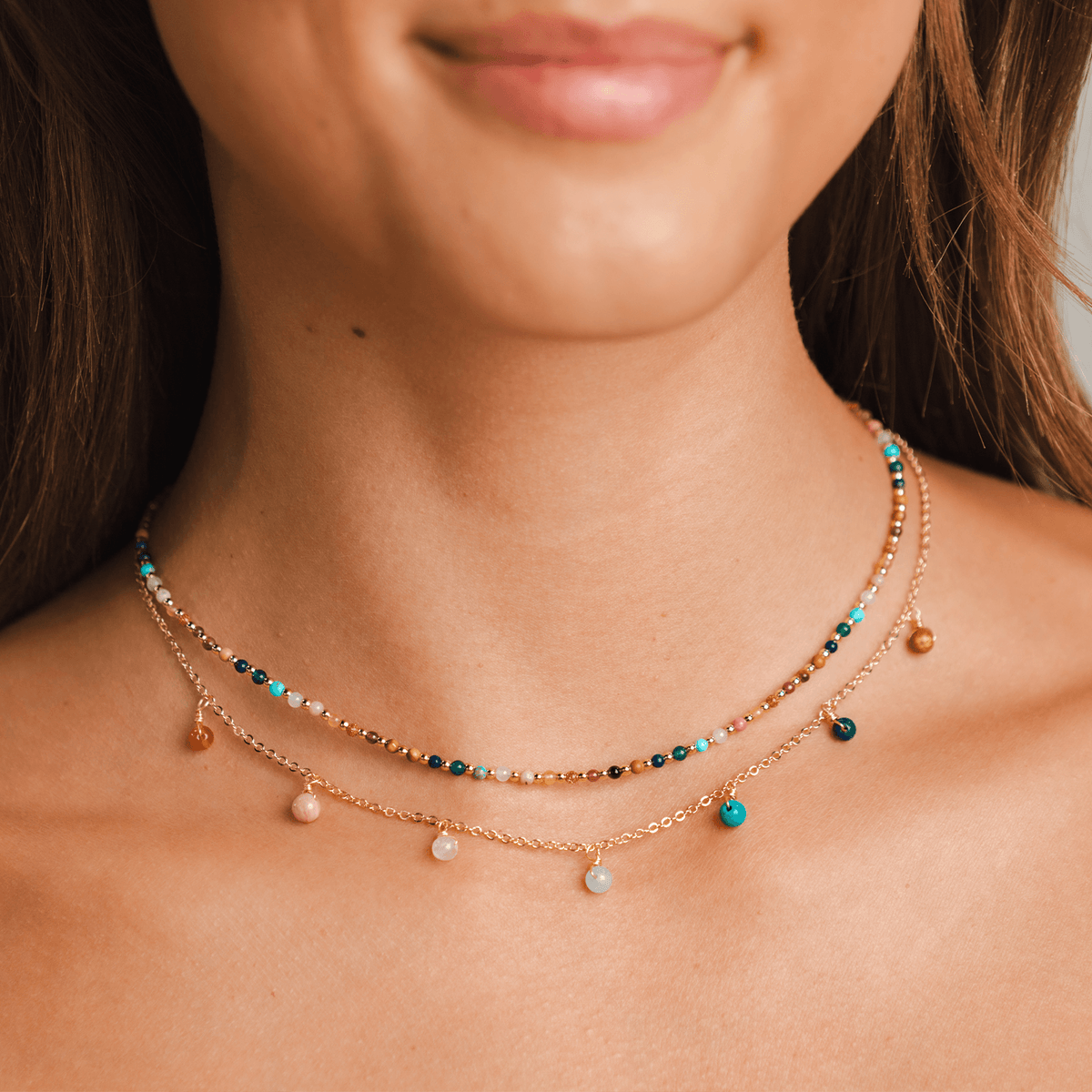 Dainty necklace with assorted multi-color stones and gold beads