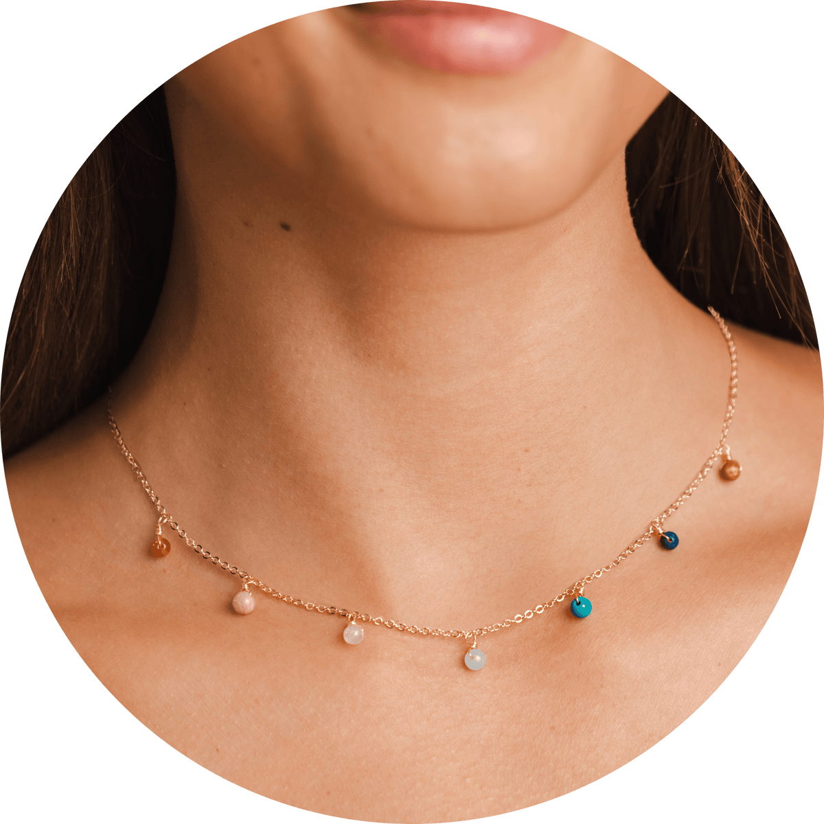 Dewdrop charm necklace with multicolor stones and a gold chain