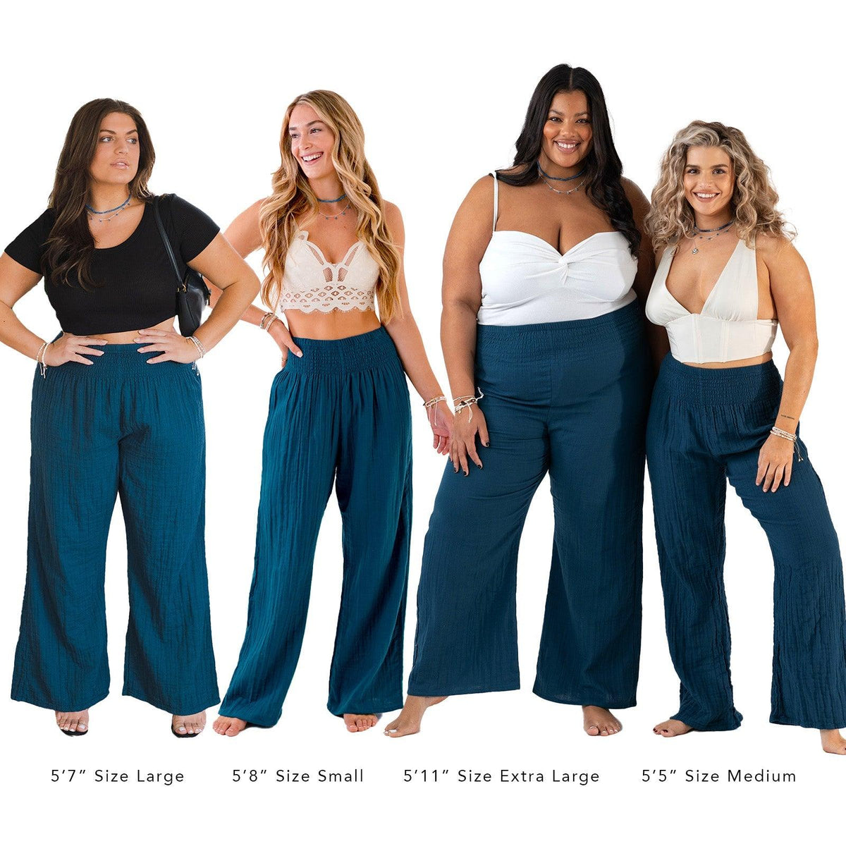 Models of different sizes wearing dark blue wide leg cotton gauze pants