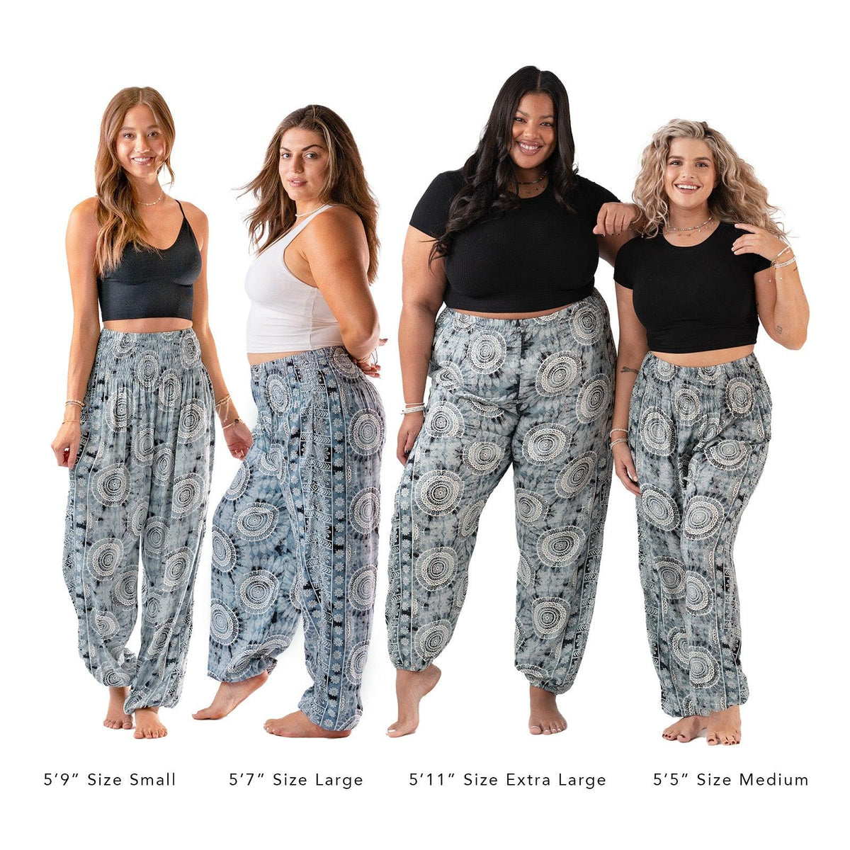 Models of different sizes wearing gray watercolor and white mandala print harem pants. Showcasing the fit of the harem pants of both curve and standard sizes.